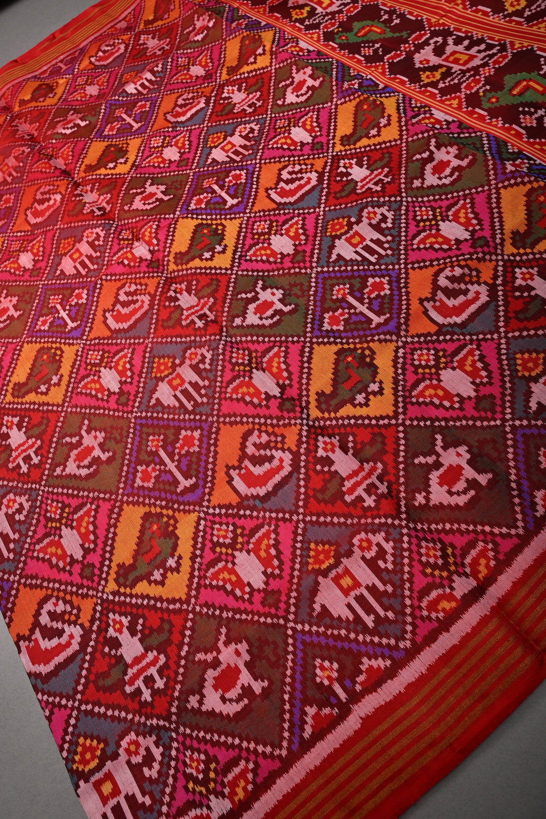 Maroon-Red Patan Patola Single Ikkat handwoven Pure Silk Saree with Geometric Motifs and Minimal Border  | SILK MARK CERTIFIED | SHOBITAM