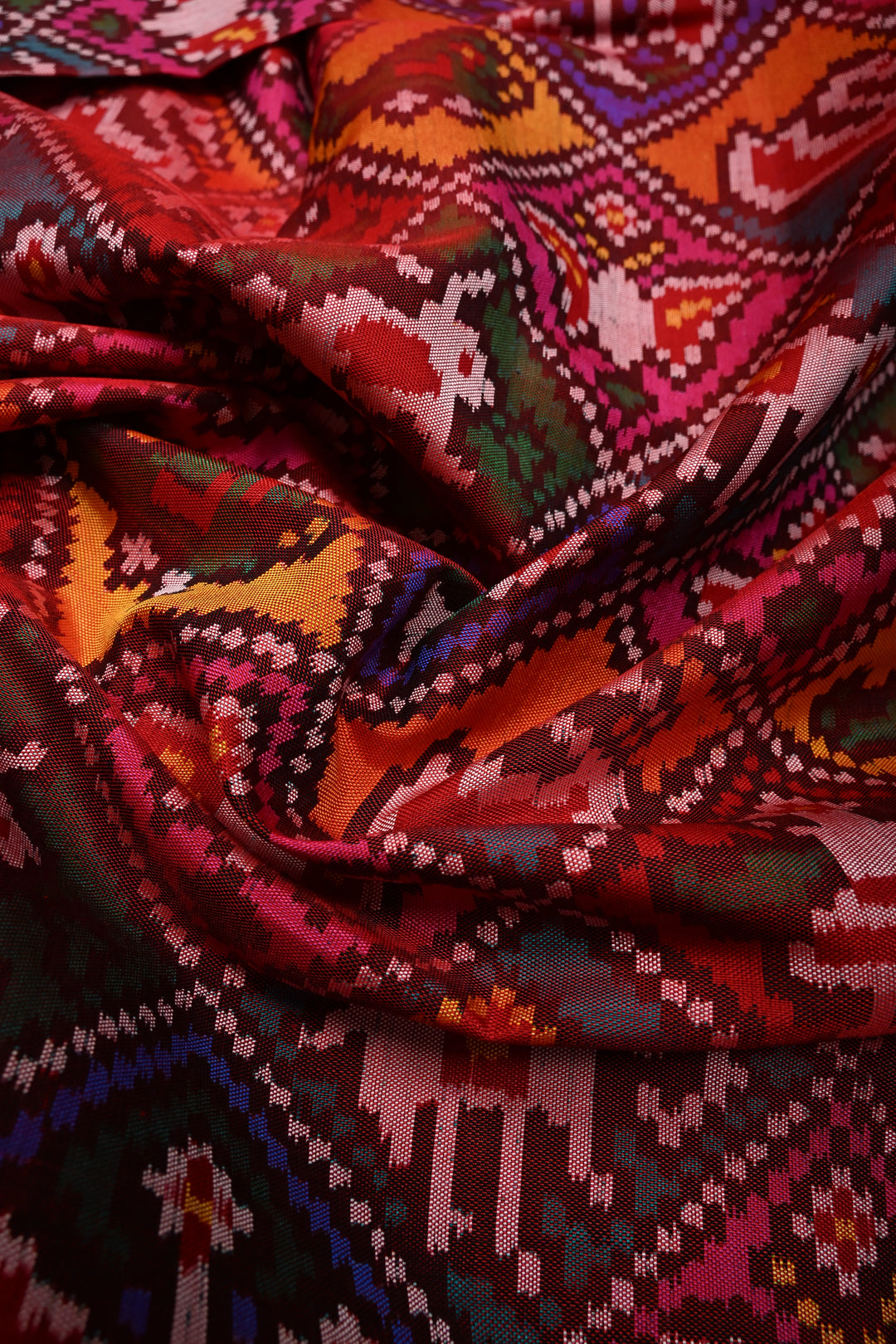 Maroon-Red Patan Patola Single Ikkat handwoven Pure Silk Saree with Geometric Motifs and Minimal Border  | SILK MARK CERTIFIED | SHOBITAM