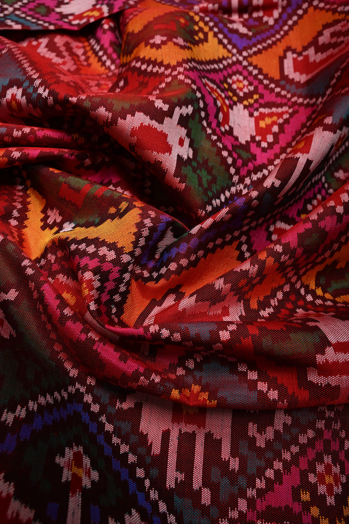 Maroon-Red Patan Patola Single Ikkat handwoven Pure Silk Saree with Geometric Motifs and Minimal Border  | SILK MARK CERTIFIED | SHOBITAM