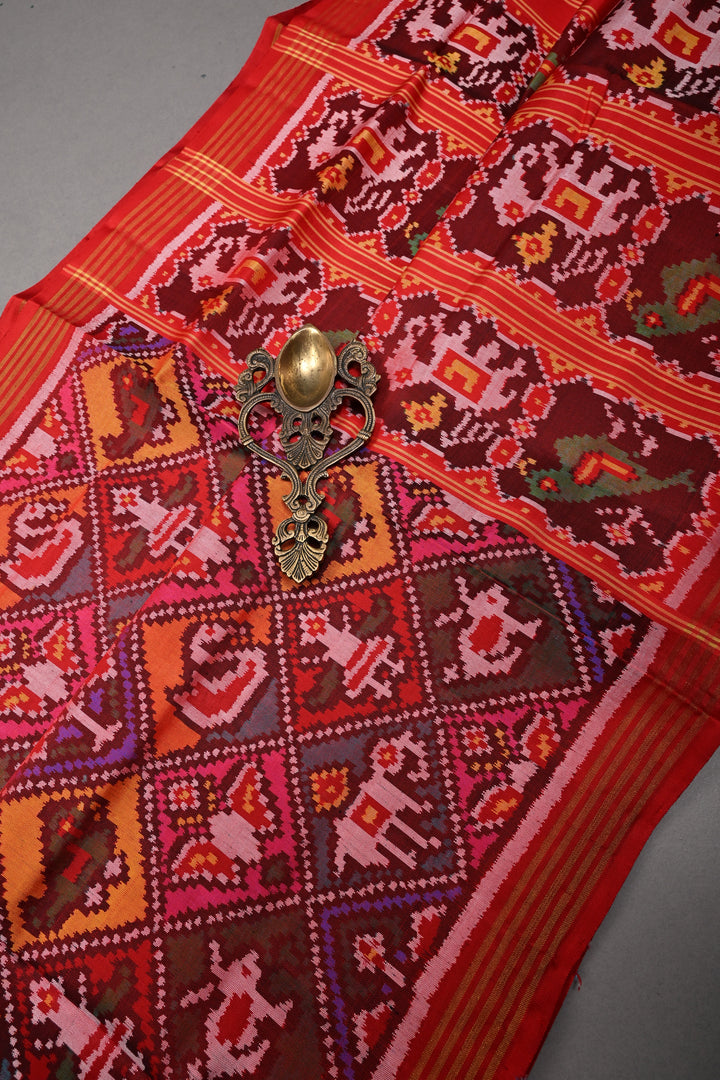 Maroon-Red Patan Patola Single Ikkat handwoven Pure Silk Saree with Geometric Motifs and Minimal Border  | SILK MARK CERTIFIED | SHOBITAM