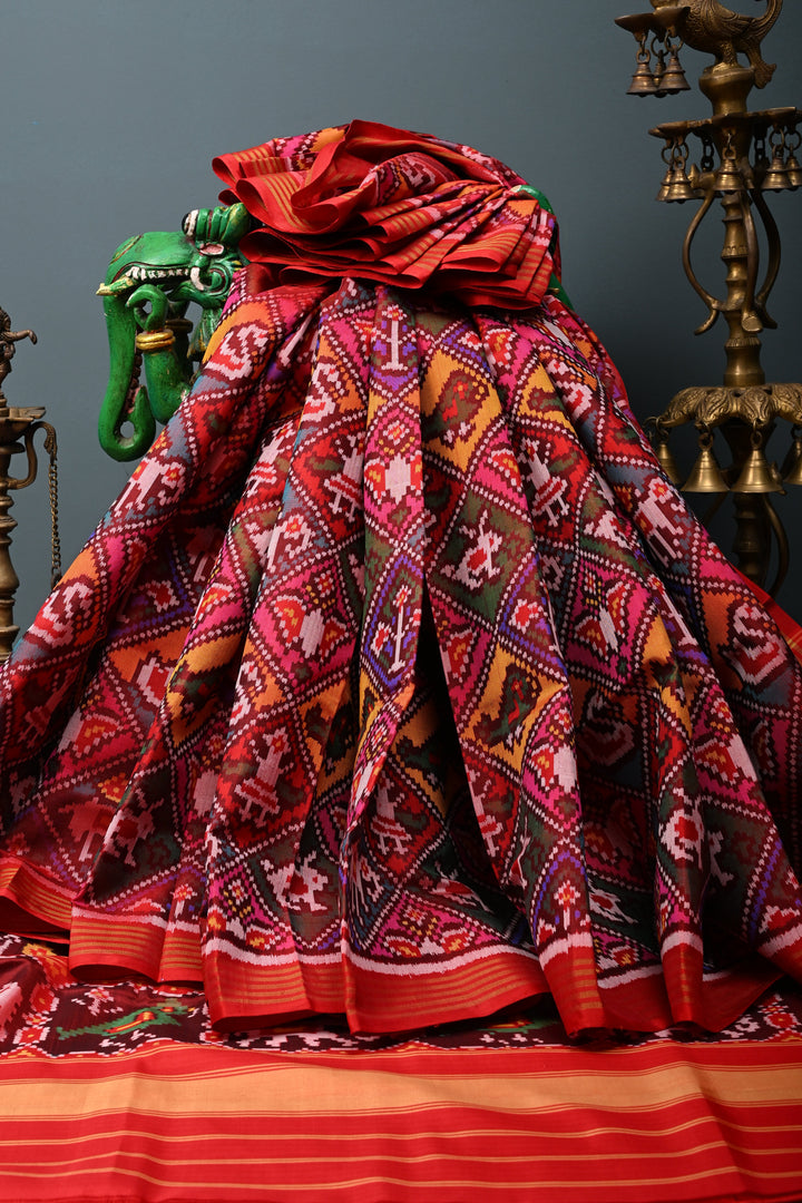 Maroon-Red Patan Patola Single Ikkat handwoven Pure Silk Saree with Geometric Motifs and Minimal Border  | SILK MARK CERTIFIED | SHOBITAM