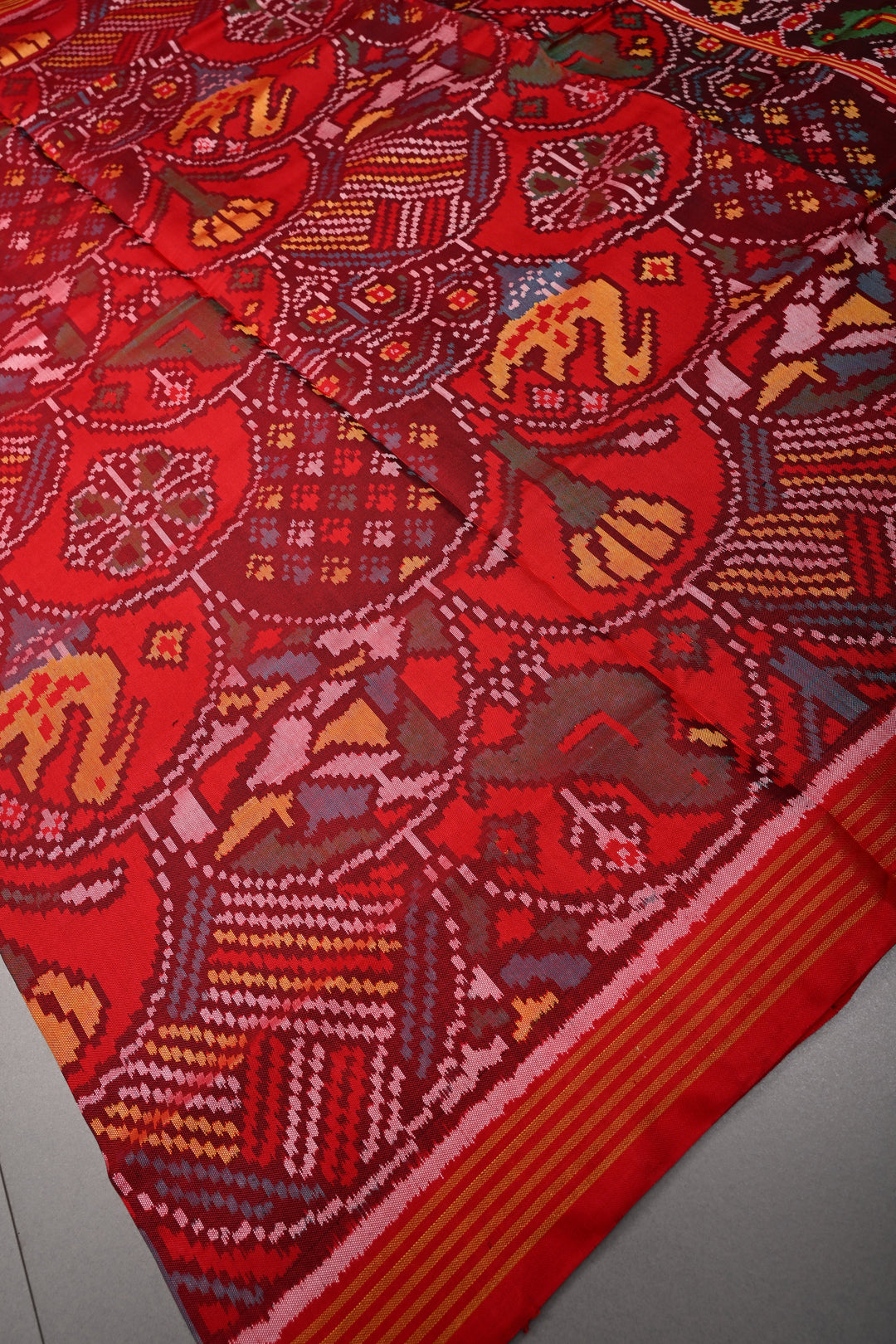 Red Patola Single Ikkat Silk Saree with Intricate Geometric Motifs and Minimal Border | SILK MARK CERTIFIED | SHOBITAM