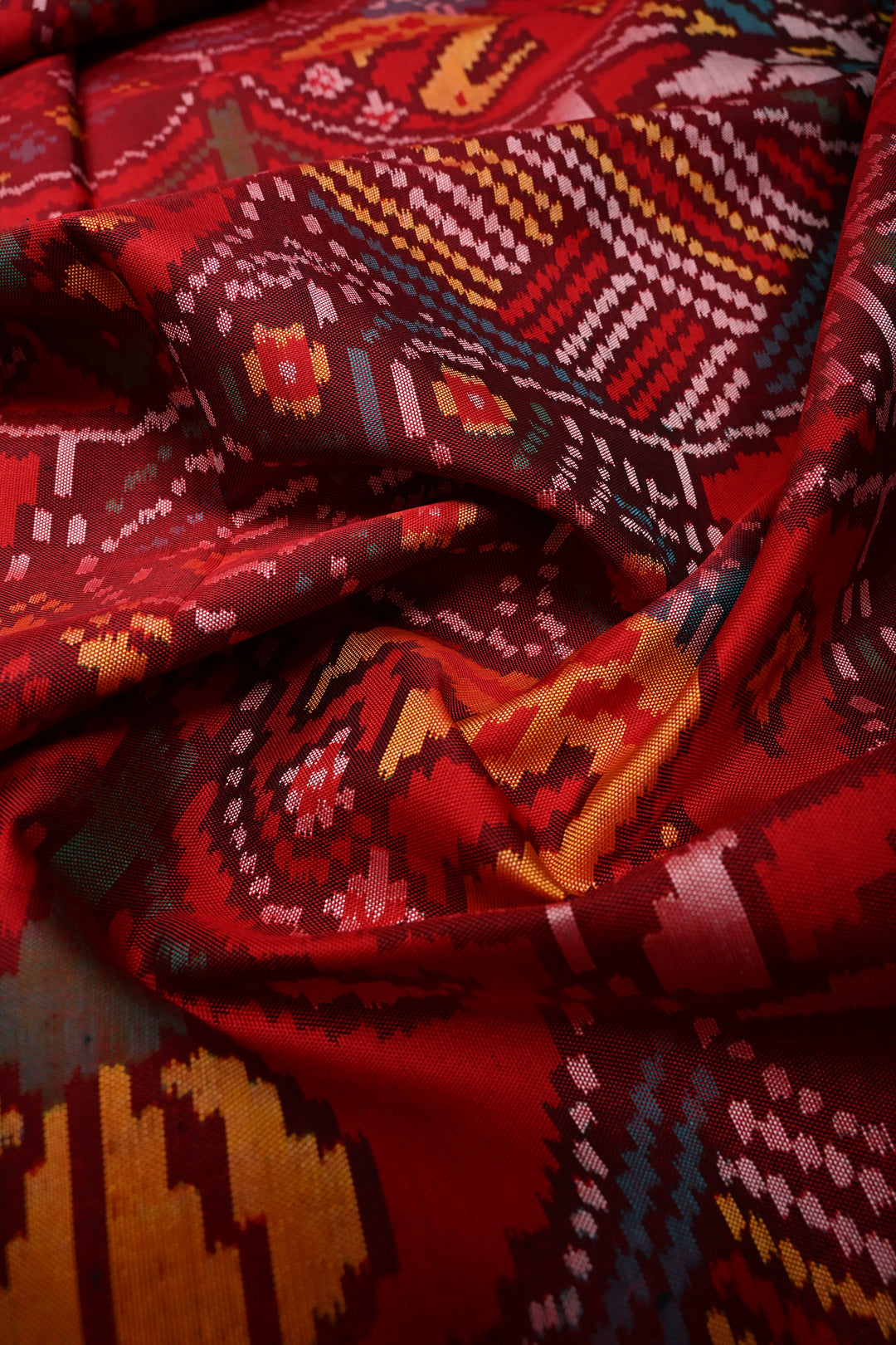 Red Patola Single Ikkat Silk Saree with Intricate Geometric Motifs and Minimal Border | SILK MARK CERTIFIED | SHOBITAM