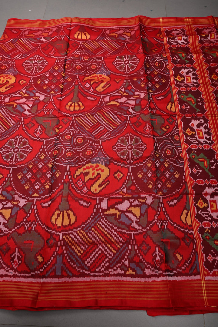 Red Patola Single Ikkat Silk Saree with Intricate Geometric Motifs and Minimal Border | SILK MARK CERTIFIED | SHOBITAM