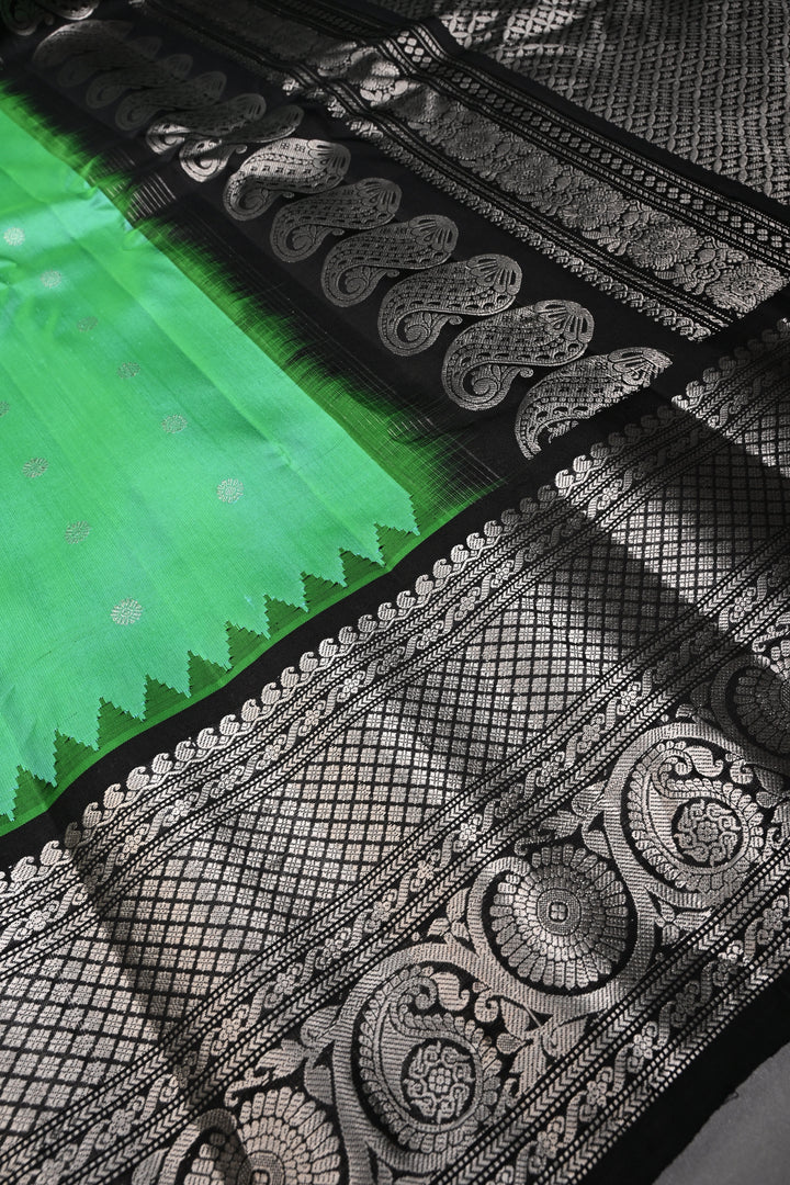 Sea Green Pure Gadwal Silk Saree with Silver Buttas and Contrast Black Zari Border| SILK MARK CERTIFIED | SHOBITAM