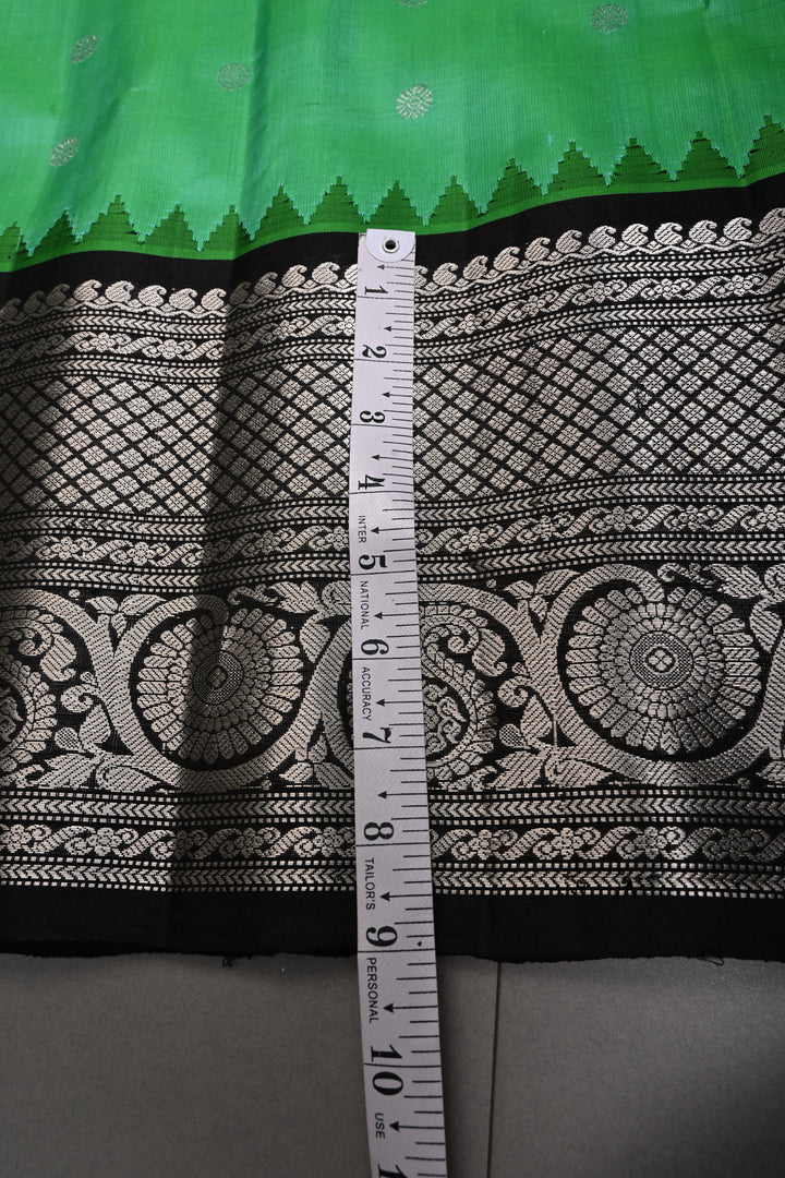 Sea Green Pure Gadwal Silk Saree with Silver Buttas and Contrast Black Zari Border| SILK MARK CERTIFIED | SHOBITAM
