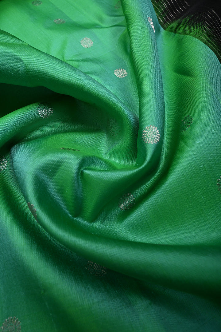 Sea Green Pure Gadwal Silk Saree with Silver Buttas and Contrast Black Zari Border| SILK MARK CERTIFIED | SHOBITAM