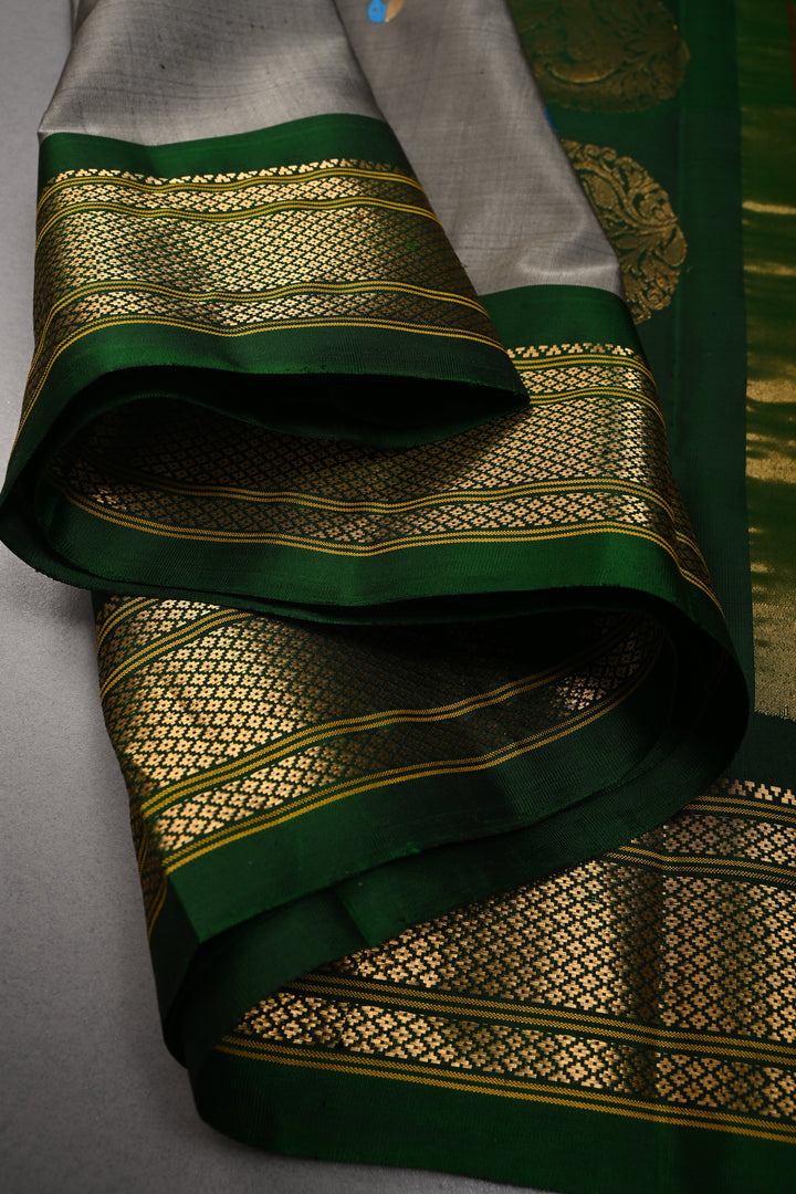 Gray Pure Gadwal Silk Saree with Meenakari Muniya Zari Buttas and Contrast Zari Border | SILK MARK CERTIFIED | SHOBITAM