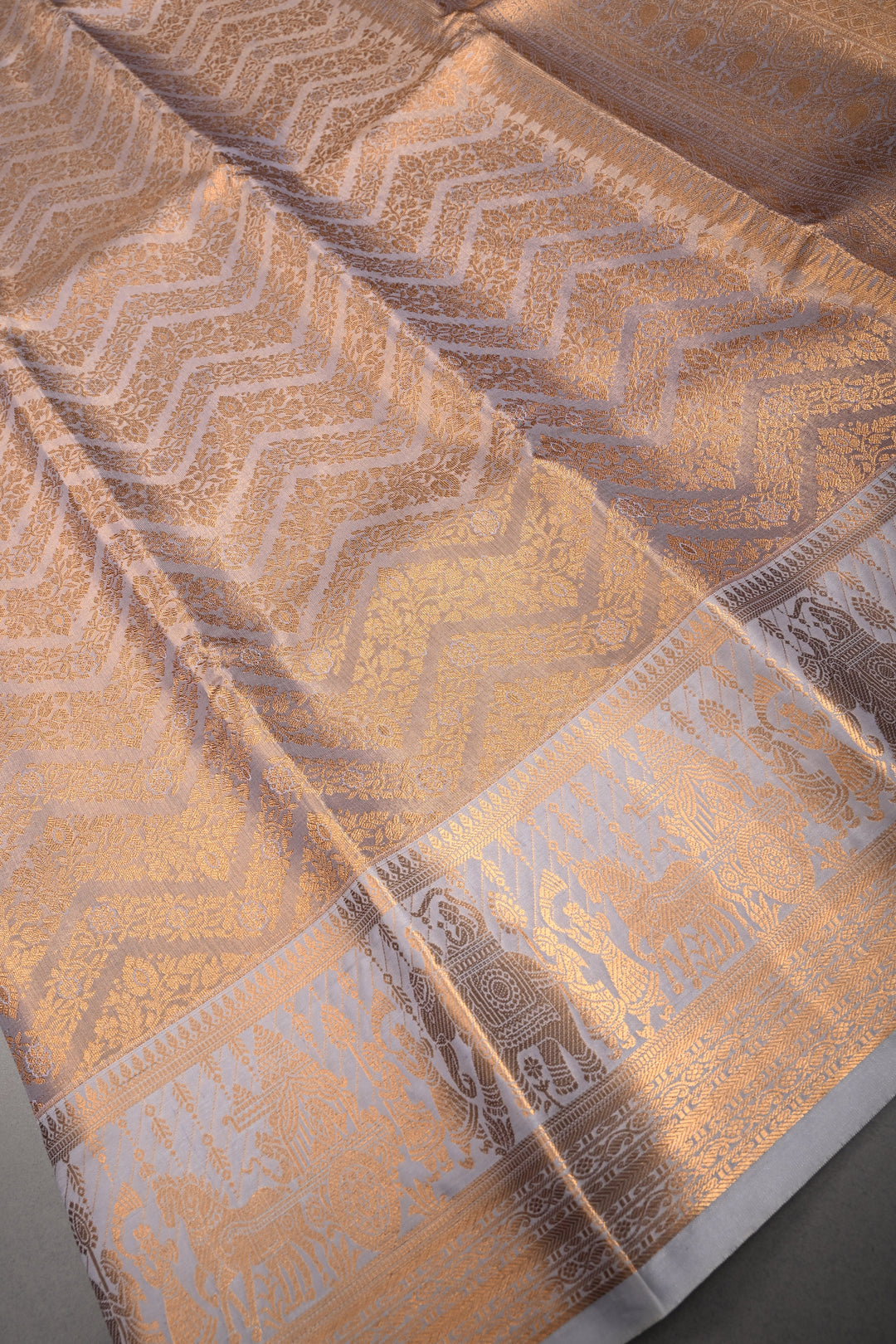 Gray Kanjivaram Soft Semi Tissue Silk Saree with Floral Chevron Design and Procession Zari Border | SHOBITAM