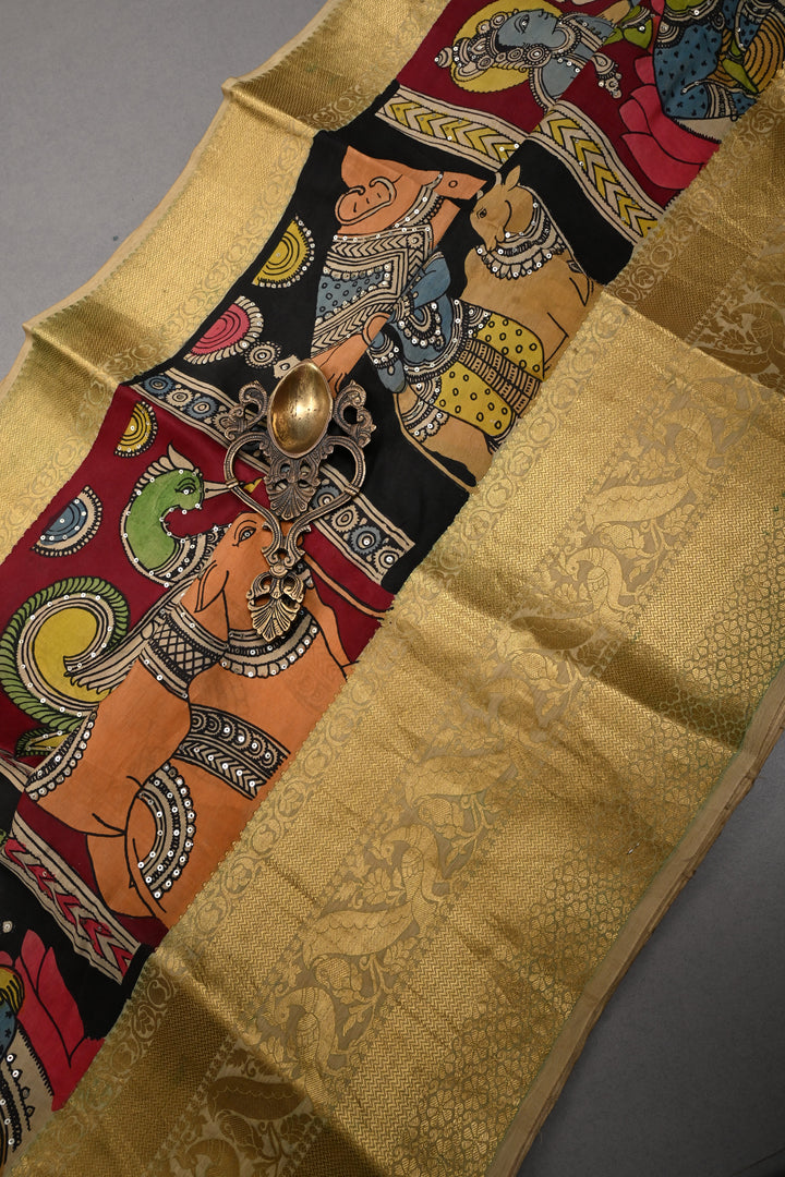 Mythological and folk Art theme : Authentic Pen kalamkari Handpainted on Pure Chennuri Silk Saree with Sequins Work and Contrast Zari Border | SHOBITAM
