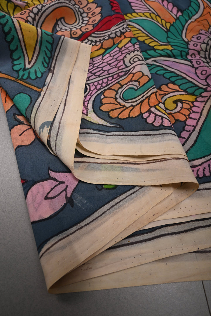 Floral and Birds Theme : Gray-Blue Authentic Pen Kalamkari Handpainted  on pure Georgette Silk Saree with Minimal Border | SILK MARK CERTIFIED | SHOBITAM