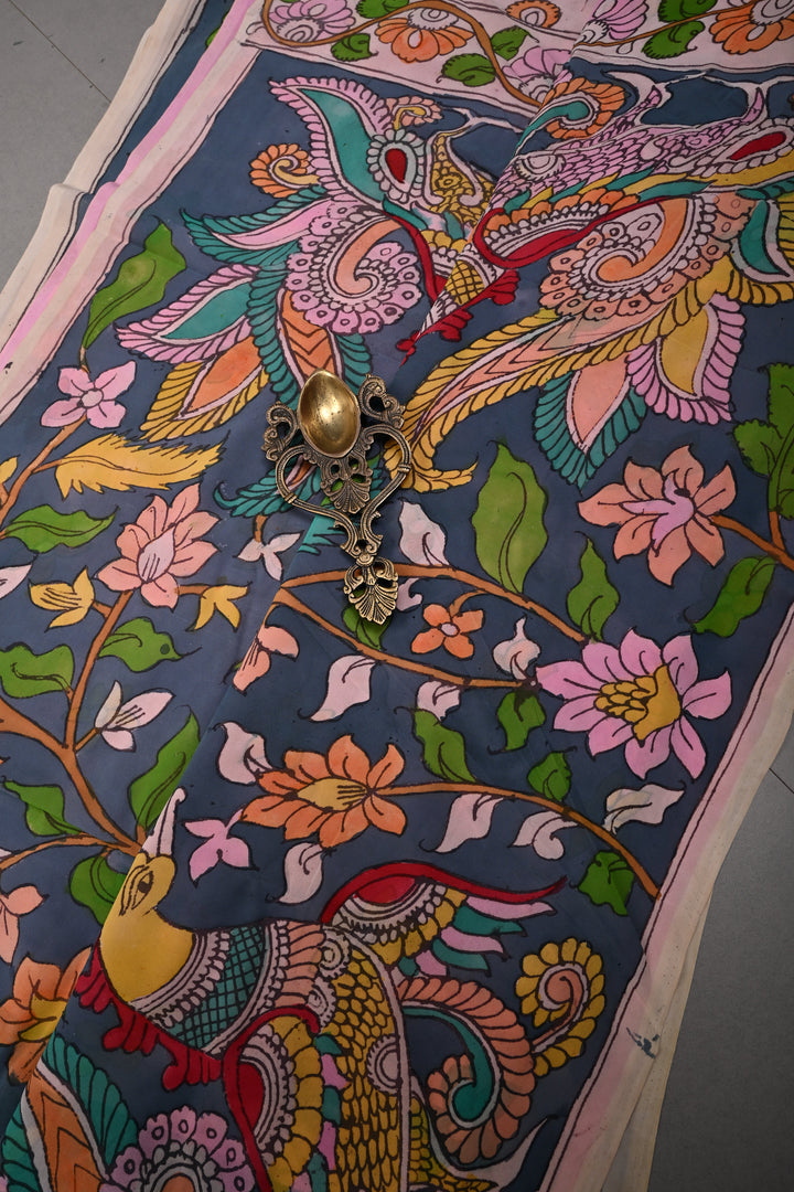 Floral and Birds Theme : Gray-Blue Authentic Pen Kalamkari Handpainted  on pure Georgette Silk Saree with Minimal Border | SILK MARK CERTIFIED | SHOBITAM