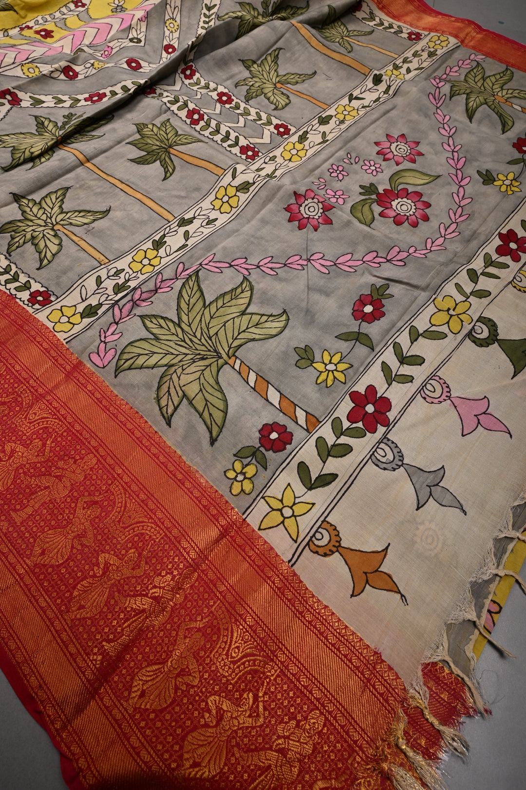 Floral and Palm Tree Theme : Yellow Authentic Pen kalamkari Handpainted on Pure Chennuri Silk Saree with Dancing Queens Zari Border | SHOBITAM