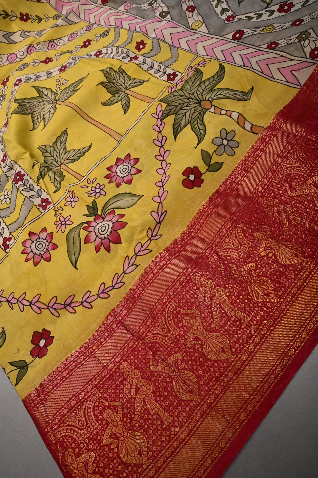 Floral and Palm Tree Theme : Yellow Authentic Pen kalamkari Handpainted on Pure Chennuri Silk Saree with Dancing Queens Zari Border | SHOBITAM