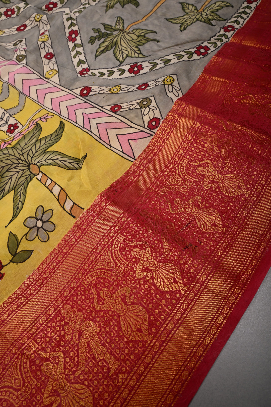 Floral and Palm Tree Theme : Yellow Authentic Pen kalamkari Handpainted on Pure Chennuri Silk Saree with Dancing Queens Zari Border | SHOBITAM