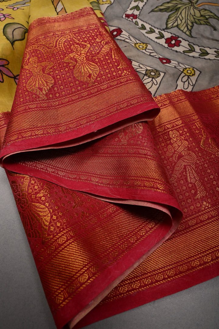 Floral and Palm Tree Theme : Yellow Authentic Pen kalamkari Handpainted on Pure Chennuri Silk Saree with Dancing Queens Zari Border | SHOBITAM