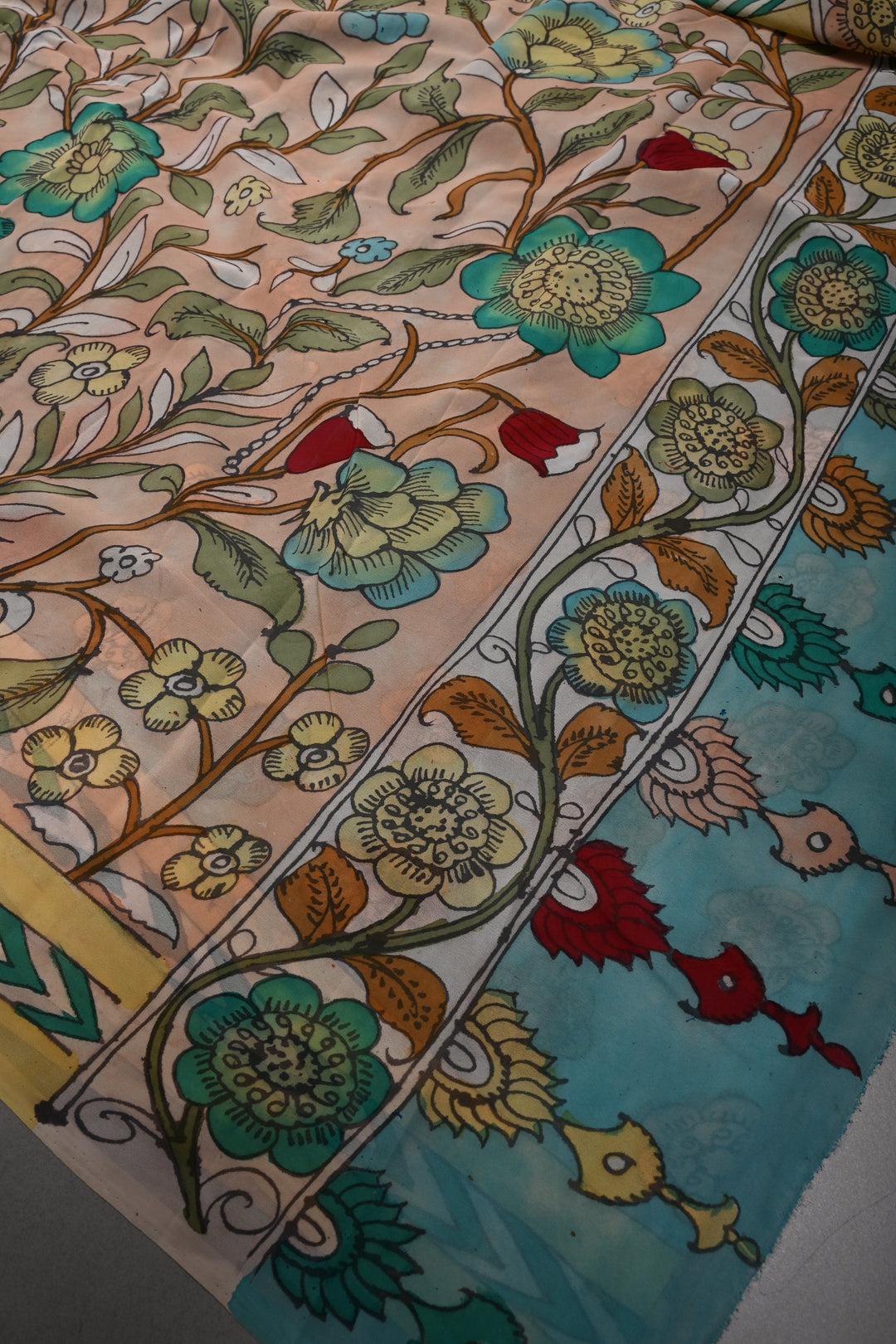 Floral Theme : Light Peach Authentic Pen Kalamkari Handpainted  on pure Georgette Silk Saree with Minimal Border | SILK MARK CERTIFIED | SHOBITAM