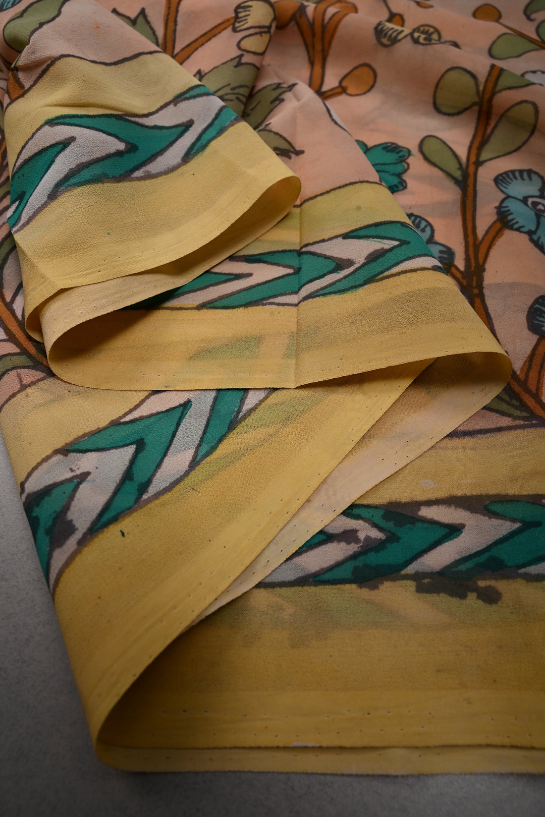 Floral Theme : Light Peach Authentic Pen Kalamkari Handpainted  on pure Georgette Silk Saree with Minimal Border | SILK MARK CERTIFIED | SHOBITAM