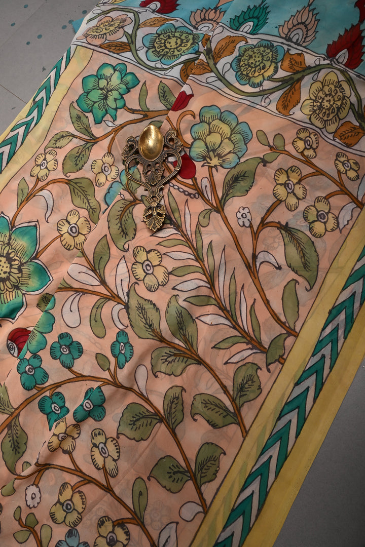 Floral Theme : Light Peach Authentic Pen Kalamkari Handpainted  on pure Georgette Silk Saree with Minimal Border | SILK MARK CERTIFIED | SHOBITAM