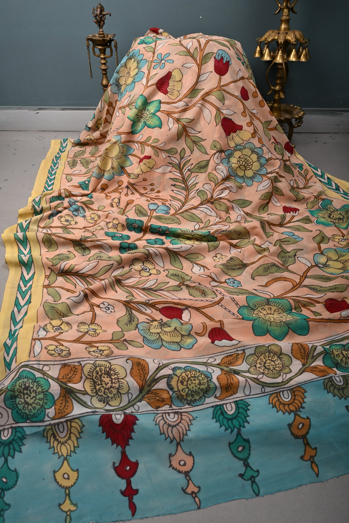Floral Theme : Light Peach Authentic Pen Kalamkari Handpainted  on pure Georgette Silk Saree with Minimal Border | SILK MARK CERTIFIED | SHOBITAM
