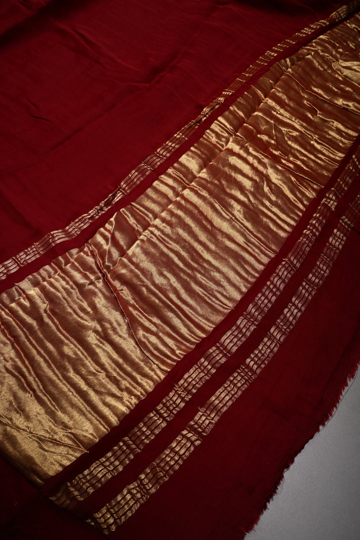 Burgundy Borderless Modal Silk Saree with Lagda Patta Crushed Tissue Pallu | SHOBITAM