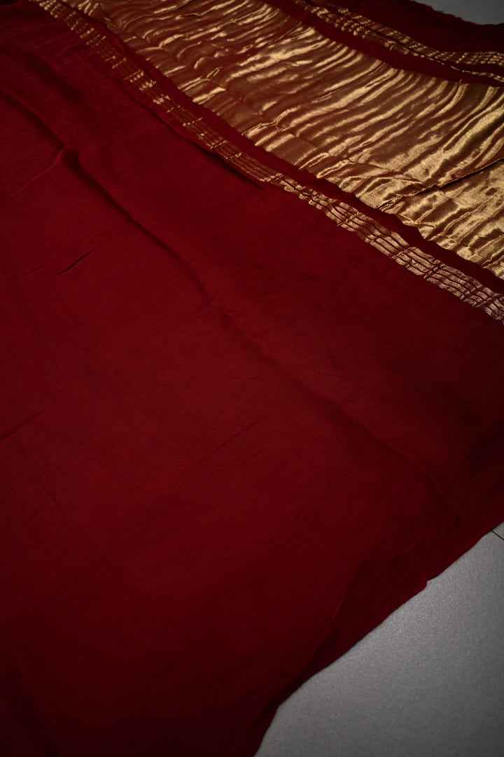 Burgundy Borderless Modal Silk Saree with Lagda Patta Crushed Tissue Pallu | SHOBITAM