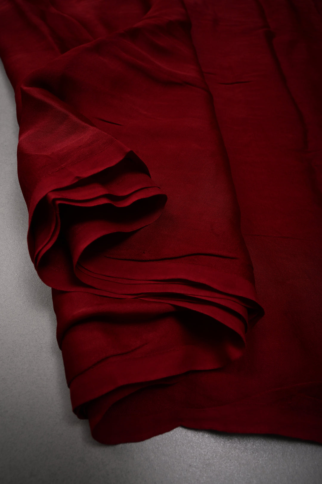 Burgundy Borderless Modal Silk Saree with Lagda Patta Crushed Tissue Pallu | SHOBITAM