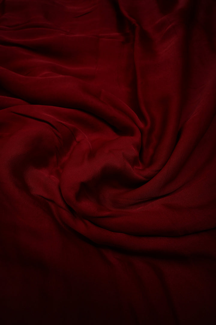 Burgundy Borderless Modal Silk Saree with Lagda Patta Crushed Tissue Pallu | SHOBITAM