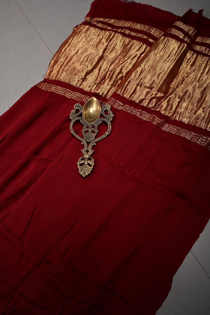Burgundy Borderless Modal Silk Saree with Lagda Patta Crushed Tissue Pallu | SHOBITAM