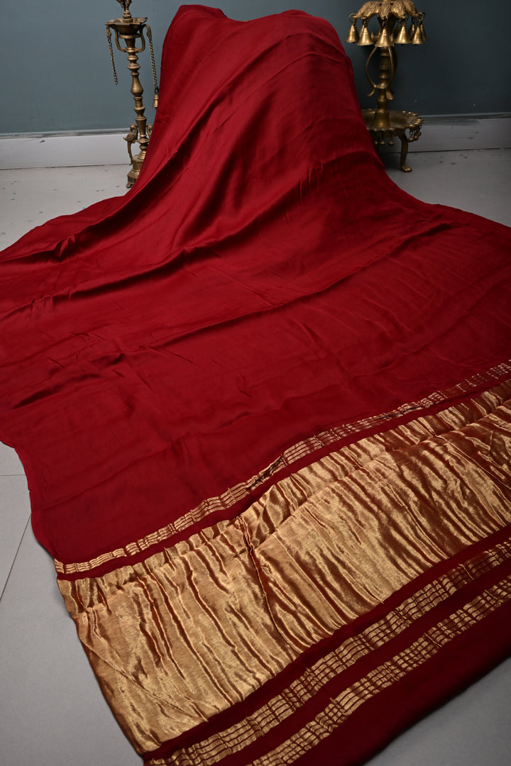 Burgundy Borderless Modal Silk Saree with Lagda Patta Crushed Tissue Pallu | SHOBITAM