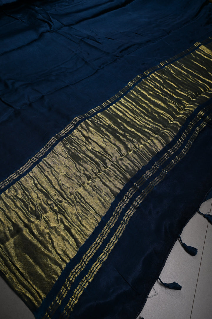 Dark Teal Borderless Modal Silk Saree with Lagda Patta Crushed Pallu | SHOBITAM