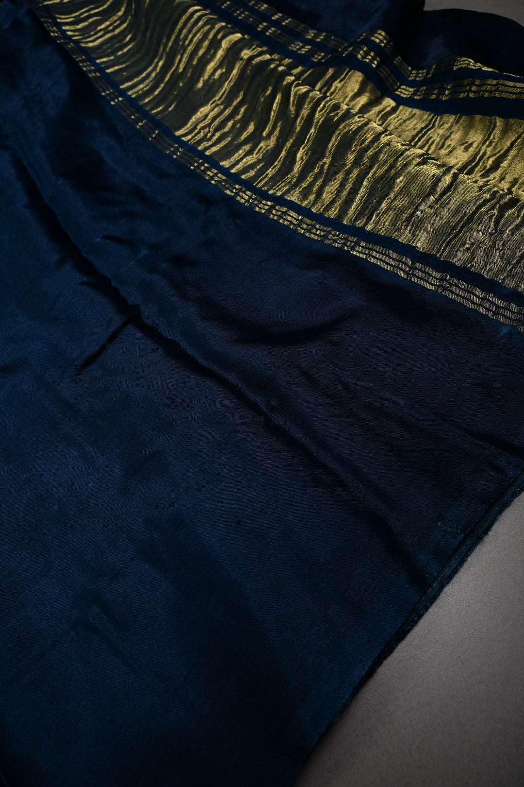 Dark Teal Borderless Modal Silk Saree with Lagda Patta Crushed Pallu | SHOBITAM