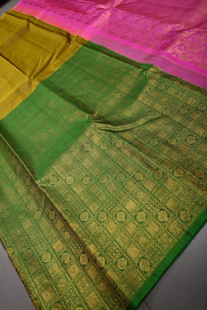 Moss Yellow Kanjivaram Pure Silk Saree with half Brocade Border in Lead Green and Pink Contrast Pallu| SILK MARK CERTIFIED | SHOBITAM