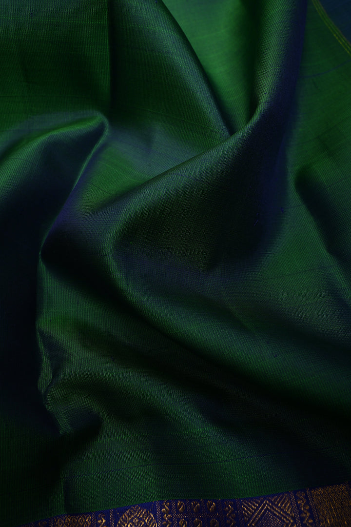 Green-Blue Dual Tone Kanjivaram Pure Silk Saree with Patola Brocade Half Border and Pallu | SILK MARK CERTIFIED | SHOBITAM