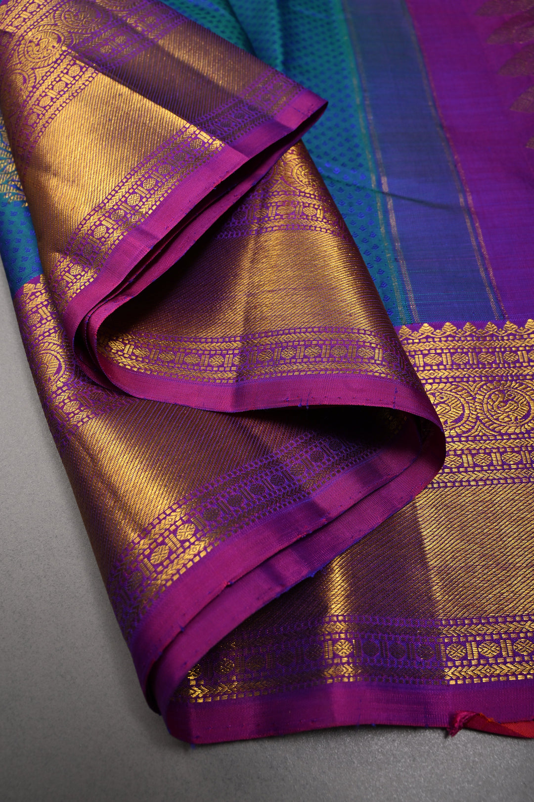 Blue-Green Dual Tone Brocade on Pure Kanjivaram Silk Handloom Saree with Zari Buttas and Contrast Zari Border | SILK MARK CERTIFIED | SHOBITAM
