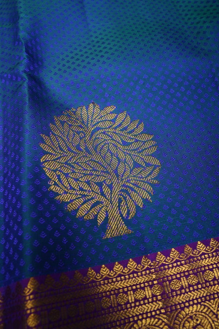 Blue-Green Dual Tone Brocade on Pure Kanjivaram Silk Handloom Saree with Zari Buttas and Contrast Zari Border | SILK MARK CERTIFIED | SHOBITAM