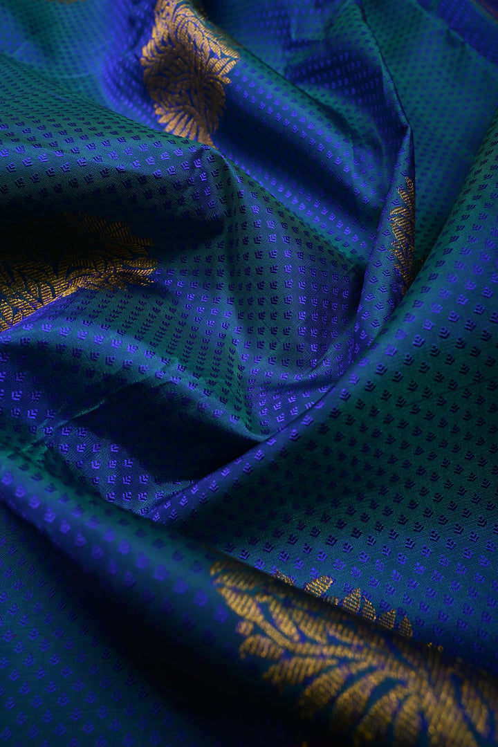 Blue-Green Dual Tone Brocade on Pure Kanjivaram Silk Handloom Saree with Zari Buttas and Contrast Zari Border | SILK MARK CERTIFIED | SHOBITAM