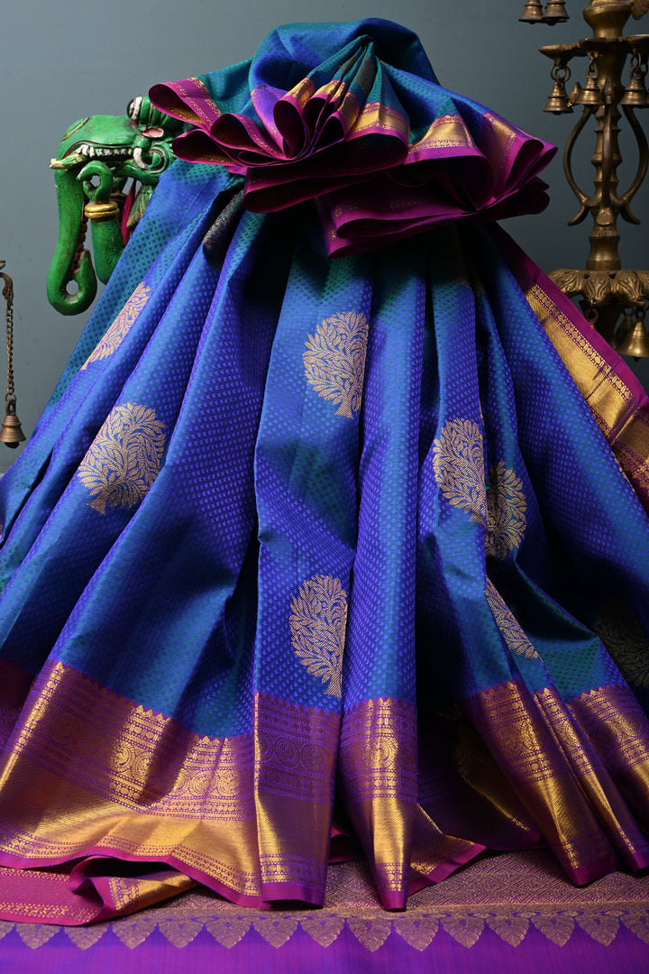Blue-Green Dual Tone Brocade on Pure Kanjivaram Silk Handloom Saree with Zari Buttas and Contrast Zari Border | SILK MARK CERTIFIED | SHOBITAM