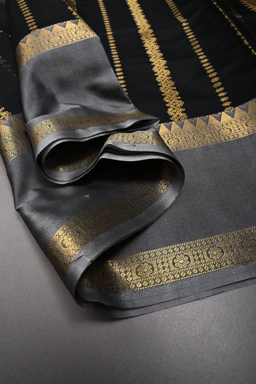 Black Kanjivaram Semi Silk Saree with Vertical Stripes and Rettaipet Zari Border  | SHOBITAM