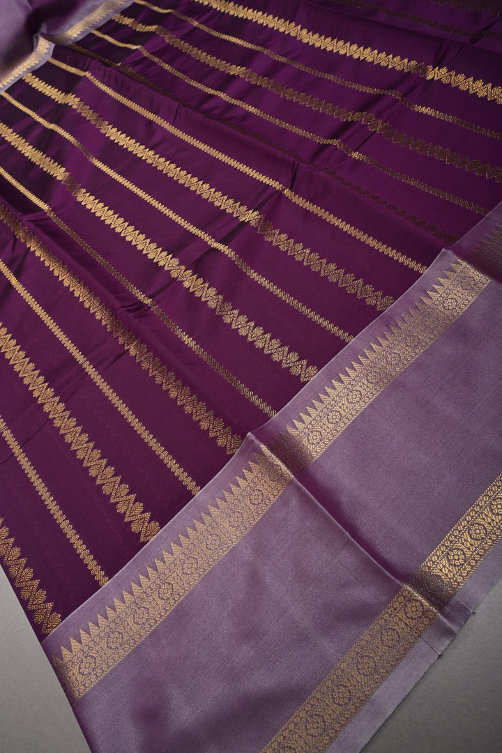 Plum Kanjivaram Soft Silk Semi Saree with Ornate Zari Stripes and Rettaipet Zari Border | SHOBITAM