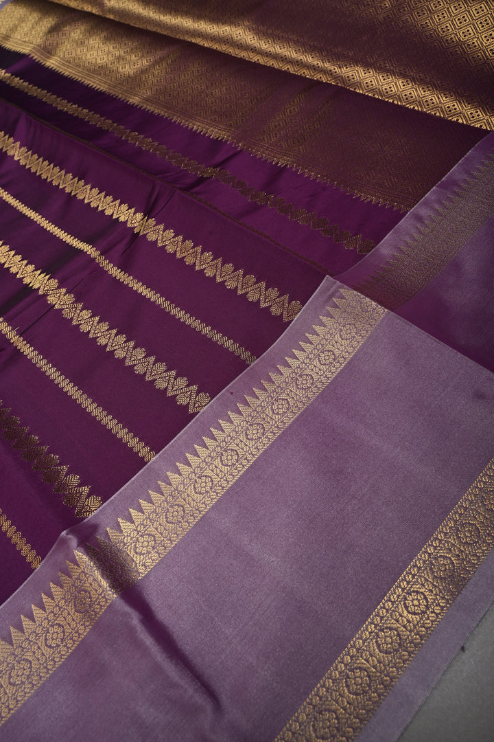 Plum Kanjivaram Soft Silk Semi Saree with Ornate Zari Stripes and Rettaipet Zari Border | SHOBITAM