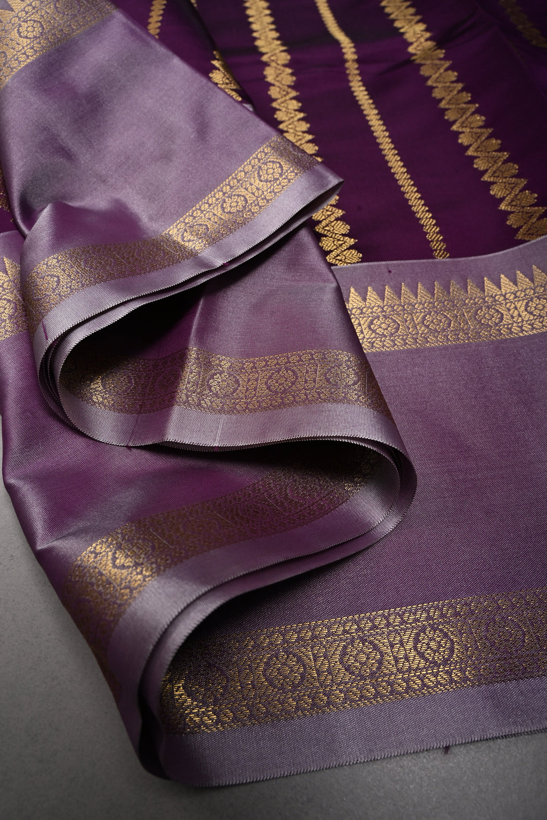 Plum Kanjivaram Soft Silk Semi Saree with Ornate Zari Stripes and Rettaipet Zari Border | SHOBITAM