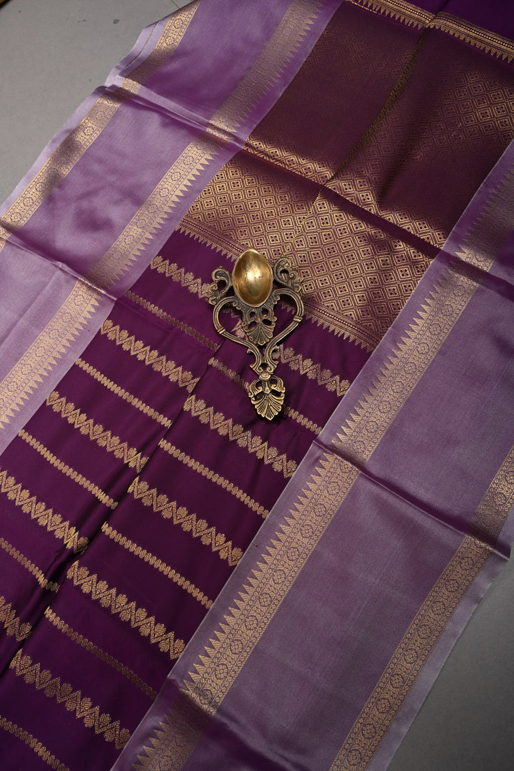 Plum Kanjivaram Soft Silk Semi Saree with Ornate Zari Stripes and Rettaipet Zari Border | SHOBITAM