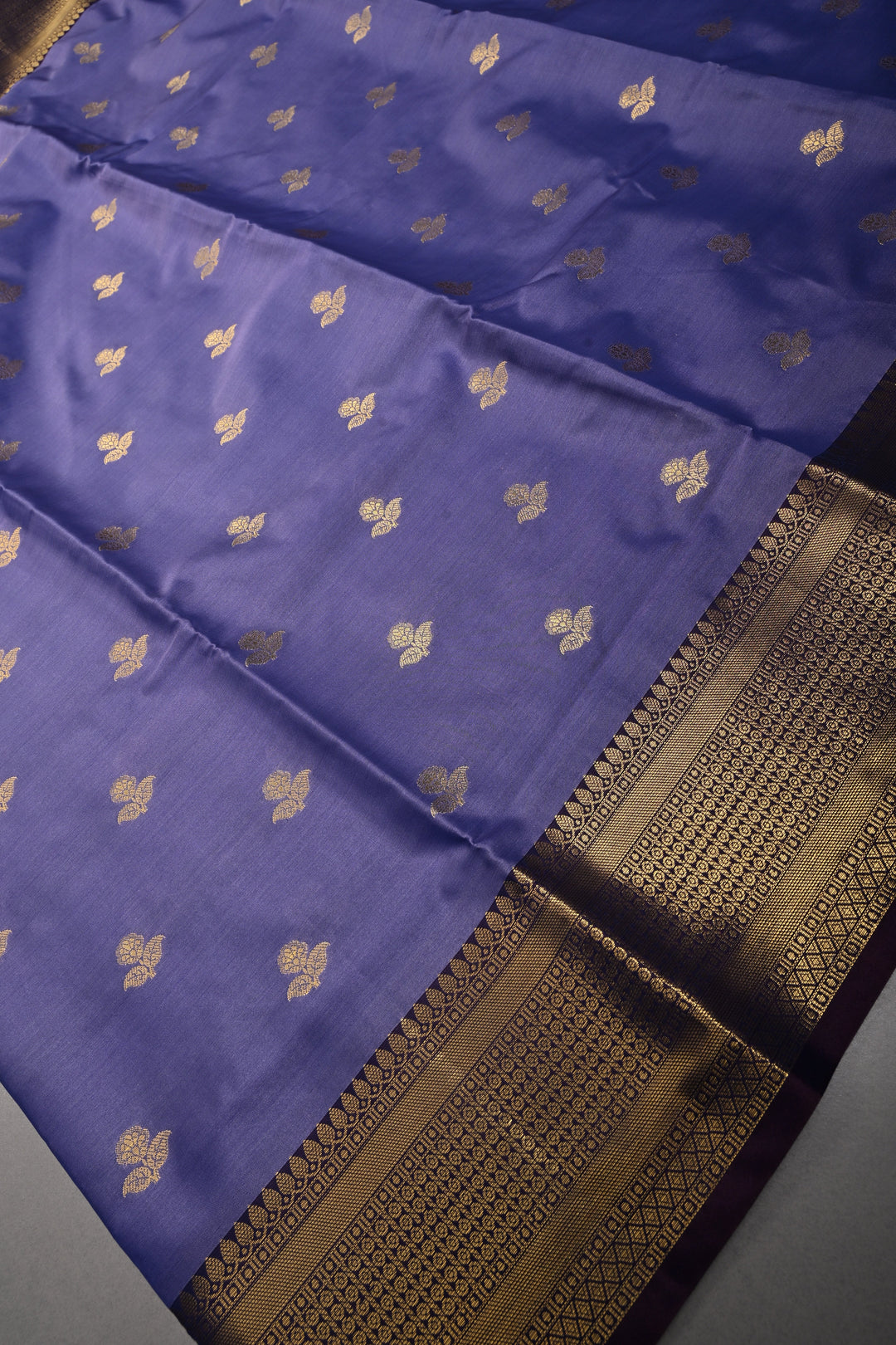 Periwinkle Kanjivaram Semi Silk Saree with Floral Zari Buttas and Contrast Zari Border  | SHOBITAM