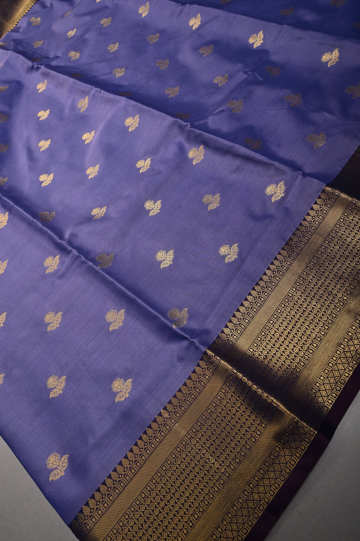 Periwinkle Kanjivaram Semi Silk Saree with Floral Zari Buttas and Contrast Zari Border  | SHOBITAM