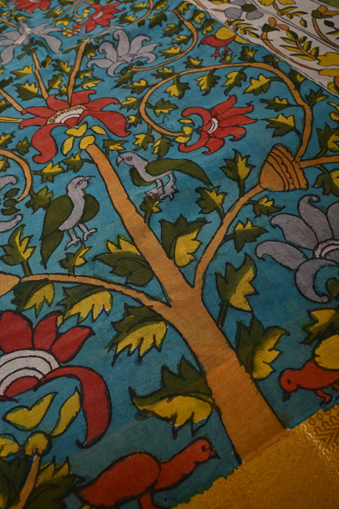 Floral and Birds Theme  :  Authentic Pen Kalamkari Handpainted on Pure Mangalagiri Silk Cotton Saree with Zari Border | SHOBITAM