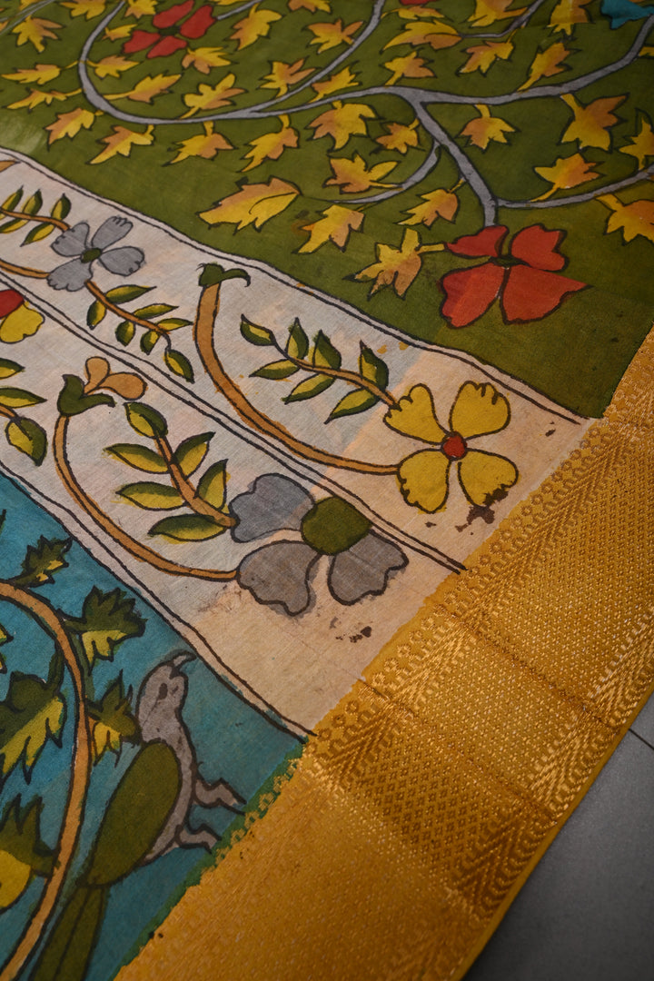 Floral and Birds Theme  :  Authentic Pen Kalamkari Handpainted on Pure Mangalagiri Silk Cotton Saree with Zari Border | SHOBITAM