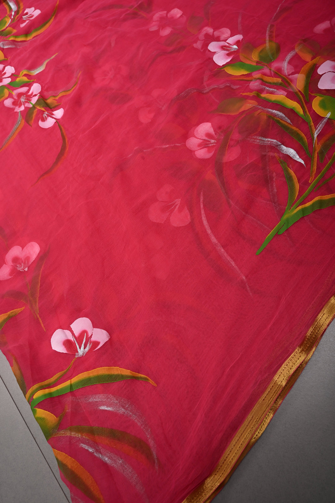 Rani Pink Georgette Saree with Floral Handpainted and Minimal Zari Border | SHOBITAM