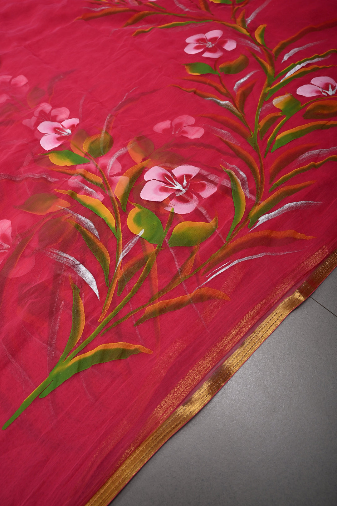 Rani Pink Georgette Saree with Floral Handpainted and Minimal Zari Border | SHOBITAM