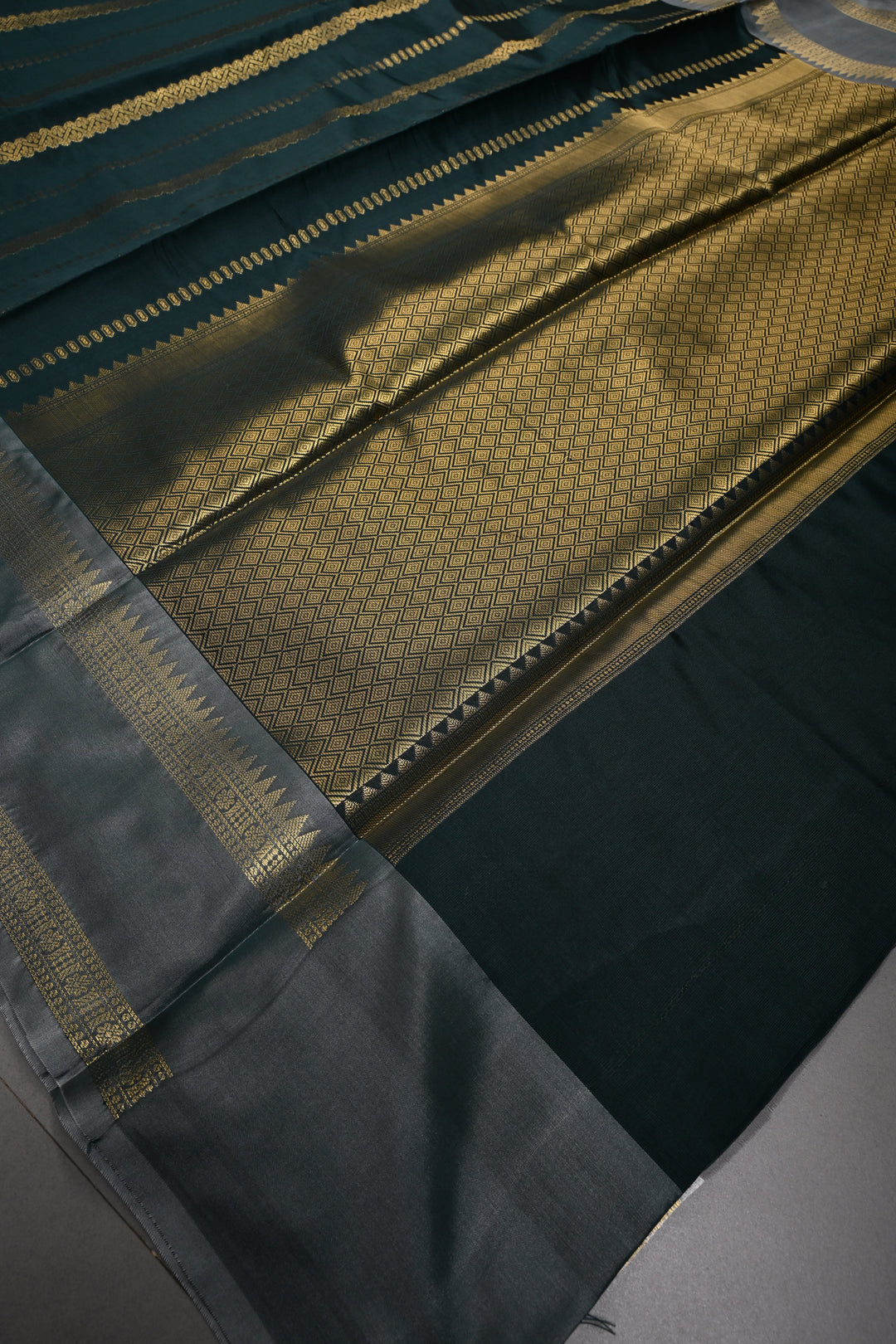 Hunter Green Kanjivaram Soft Silk Semi Saree with Ornate Zari Stripes and Rettaipet Zari Border | SHOBITAM